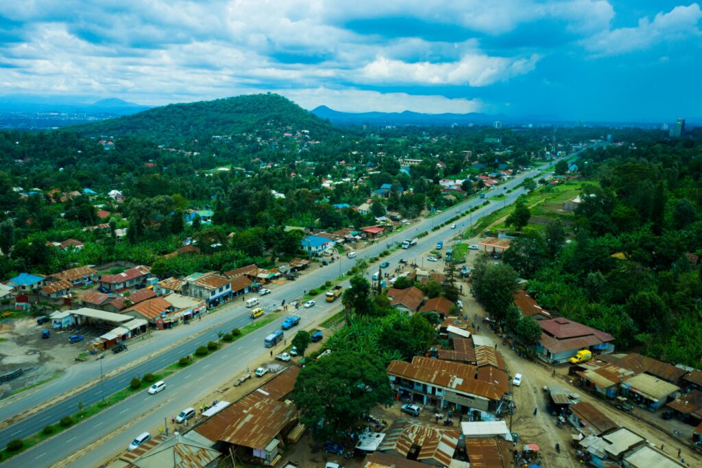Aerial view of Arusha, Tanzania showcasing scenic landscapes and urban life.